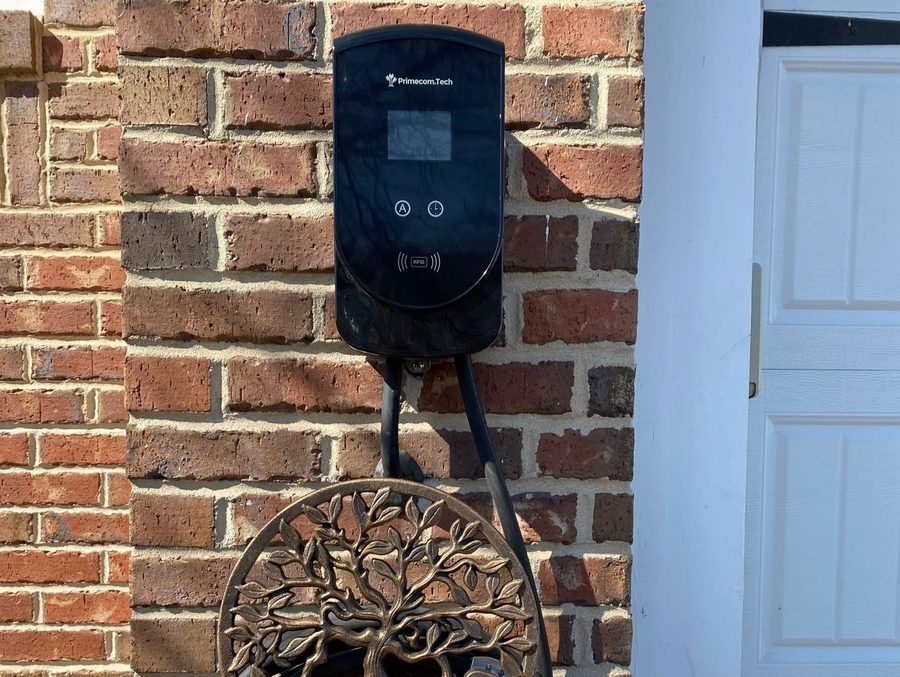 EV charger installed into exterior wall.