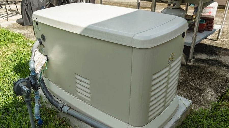 Standby generator installed outside a home.