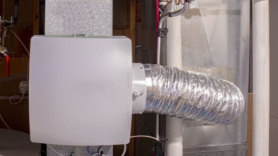 Whole-home humidifier connected to HVAC ductwork.
